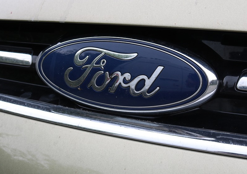 The Ford Logo on the front of a vehicle