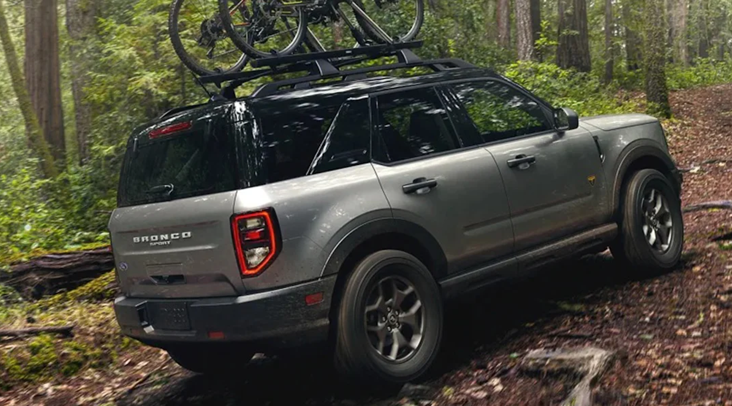 A Ford Bronco Sport in the forest off-roading