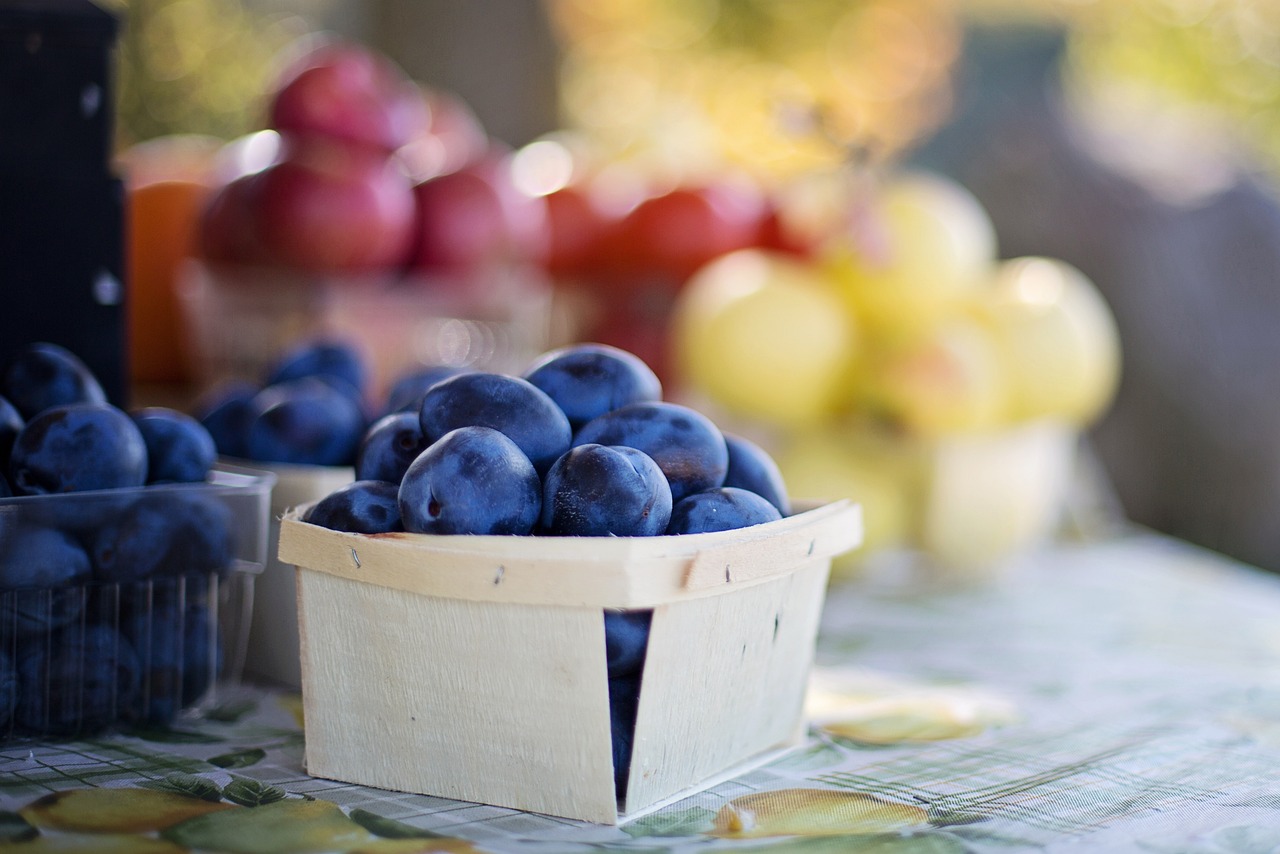 A couple boxes of produce from a farmer's market
