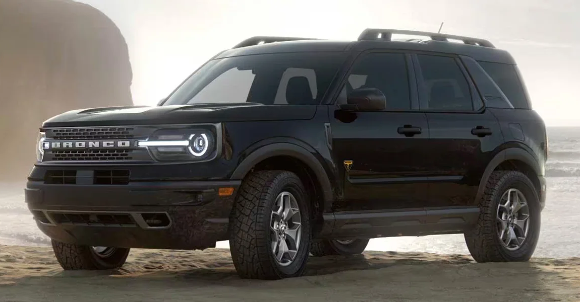 A backlit shot of the 2024 Ford Bronco Sport in a misty environment