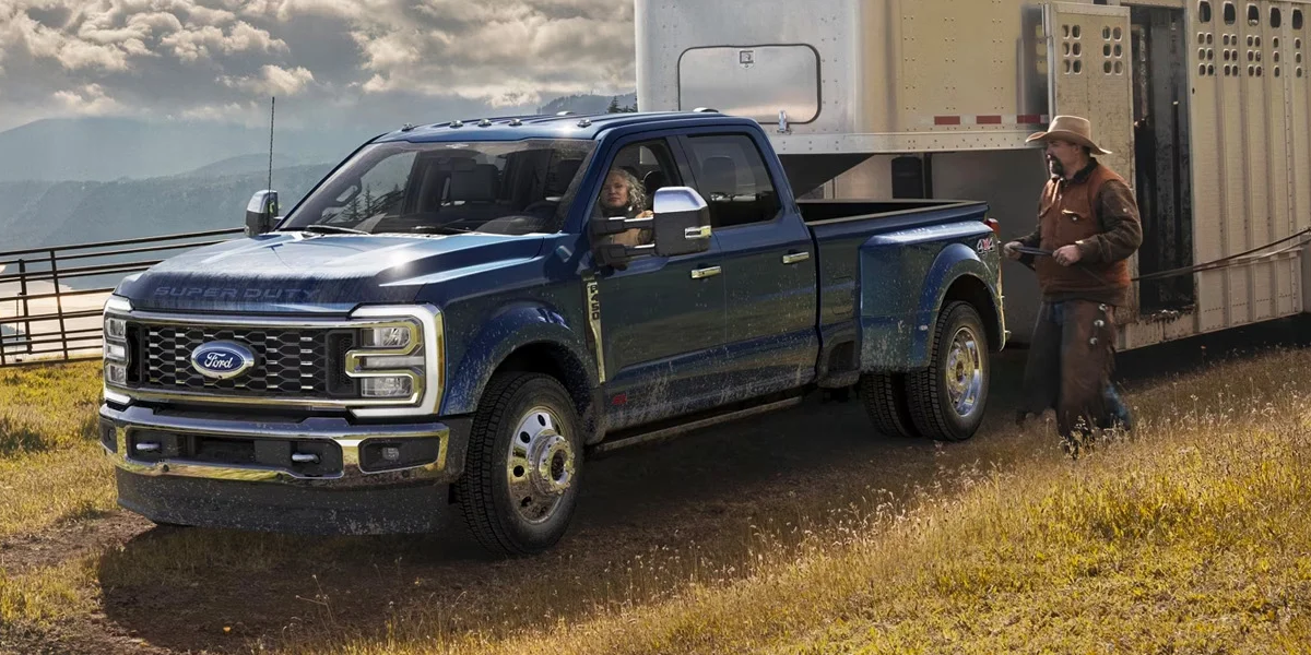 A 2024 Ford F-Series SD pickup truck hauling a trailer