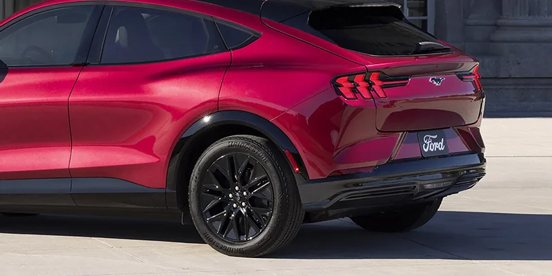 A photo of a red 2025 Ford Mustang Mach-E 