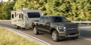 A 2025 Ford F=150 being used to tow a camping trailer near Howell, MI