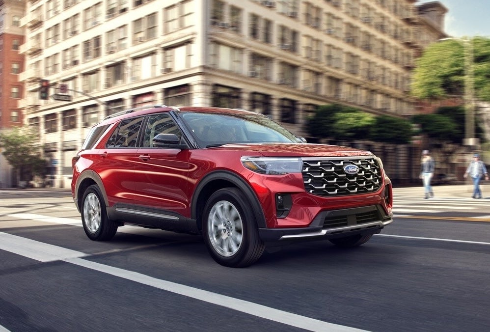 Customer signing a Ford lease at Bob Maxey Ford of Howell